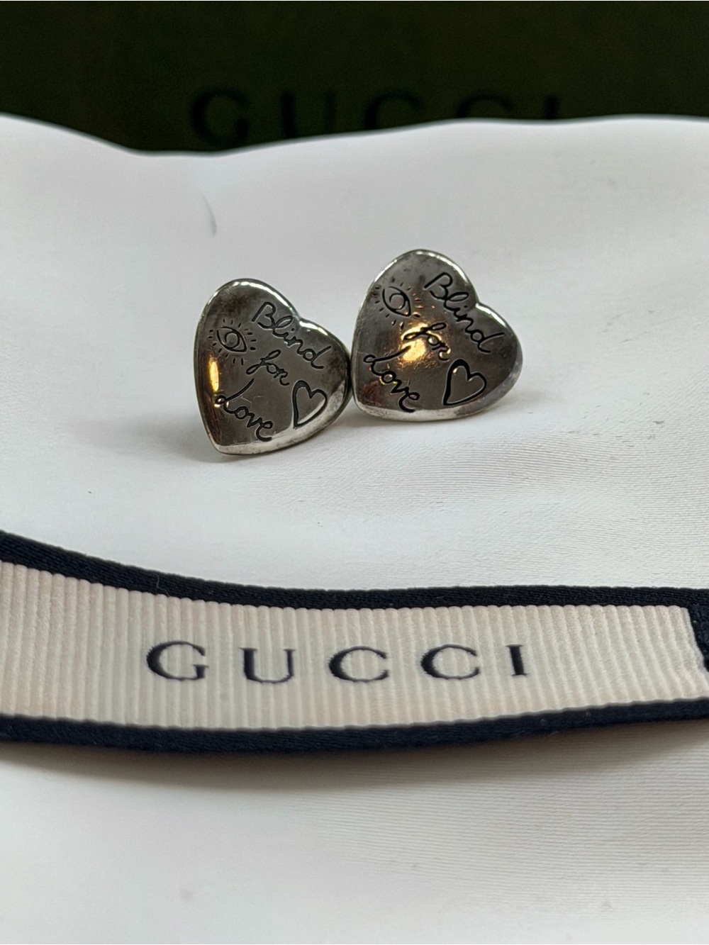Authentic Gucci blind for love earrings.